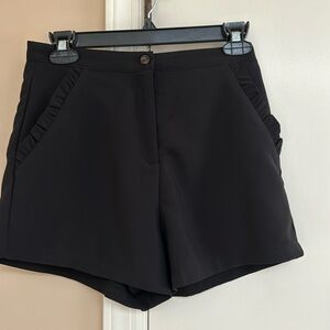 She & Sky black shorts
